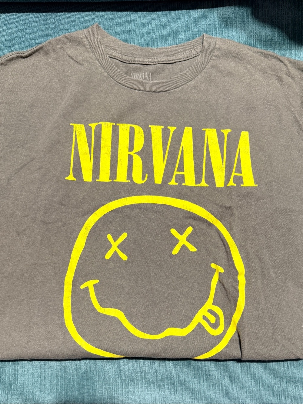 Nirvana Unisex Gray Graphic Tee with Yellow Logo